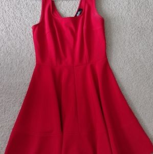 Large red fit and flare dress